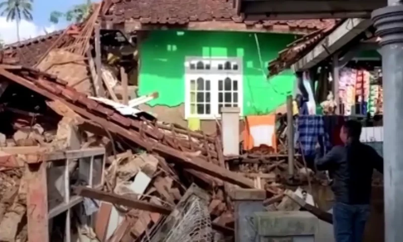 Indonesia residents run outside as shallow quake hits