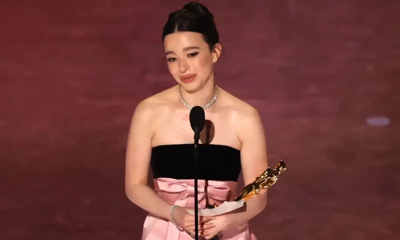Mikey Madison, 25, with her best actress award for Anora. Reuters