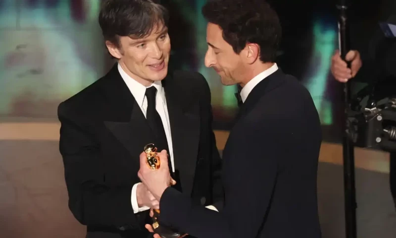 Cillian Murphy presents Adrien Brody with the Oscar for best actor. Reuters