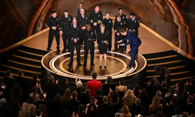 Los Angeles Fire Department staff take the stage as Conan O’Brien pays tribute. AFP