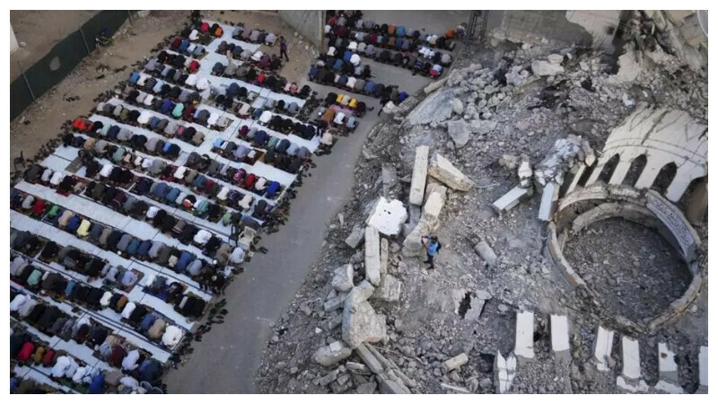 Palestinians in Gaza mark Eid with outdoor prayers in rubble