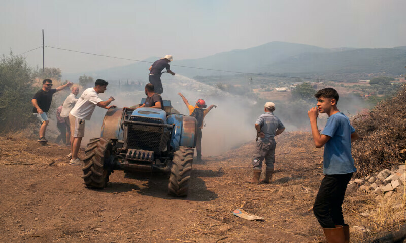 Thousands flee wildfires in Turkey as Europe is hit by early summer heatwave