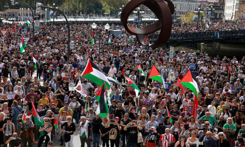 People hold flags during a demonstration in support of Palestinians in Bilbao, Spain. – Reuters file