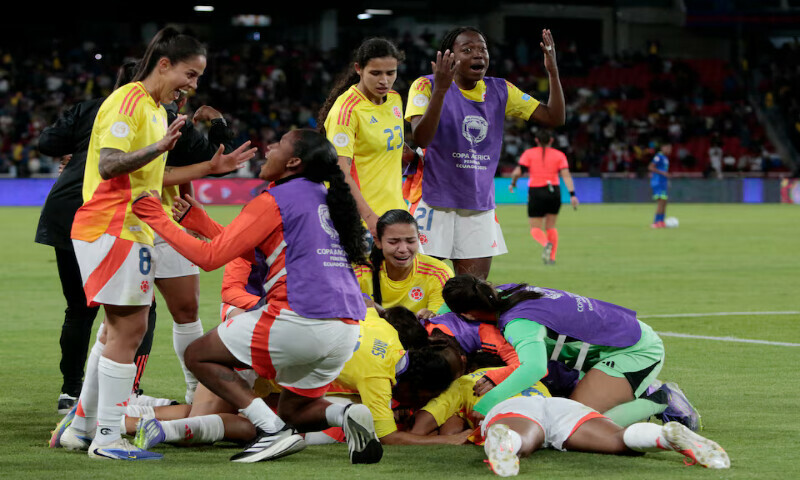 Colombia’s Leicy Santos celebrates scoring their fourth goal with teammates. – Reuters