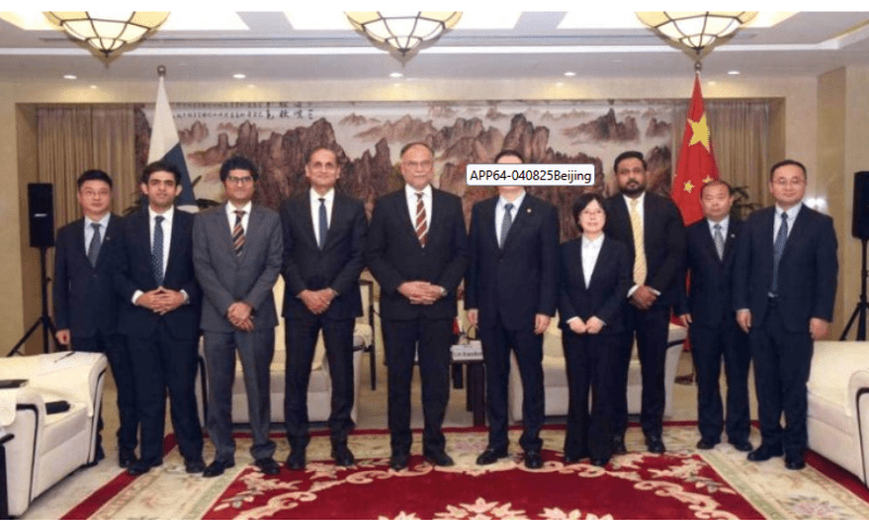 A group photo after the meeting Federal Minister for Planning Development and Special initiatives Professor Ahsan Iqbal meet with Mr Lin Xiaodan Chairman China Energy Investment. APP