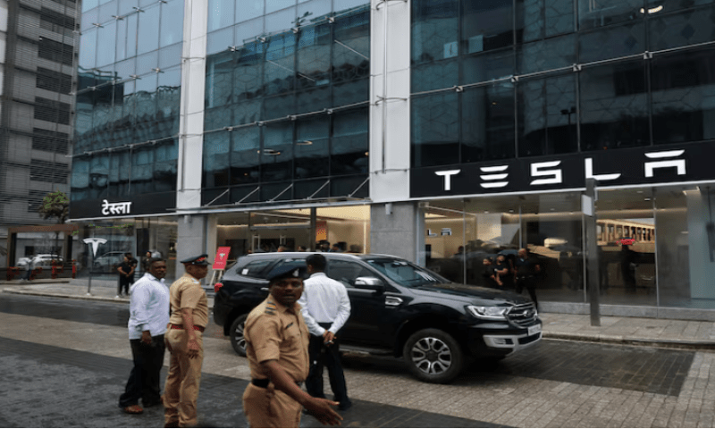 Police officers direct traffic outside the Tesla showroom ahead of its opening in Mumbai, India, July 15, 2025. Reuters file