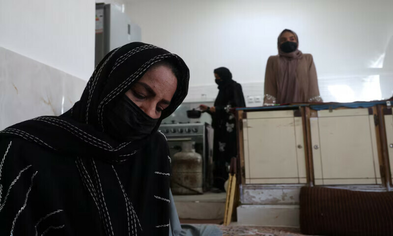 Rahela, 37, an Afghan woman, a certified makeup artist and a seamstress, sits inside her father’s house in Herat, Afghanistan. – Reuters