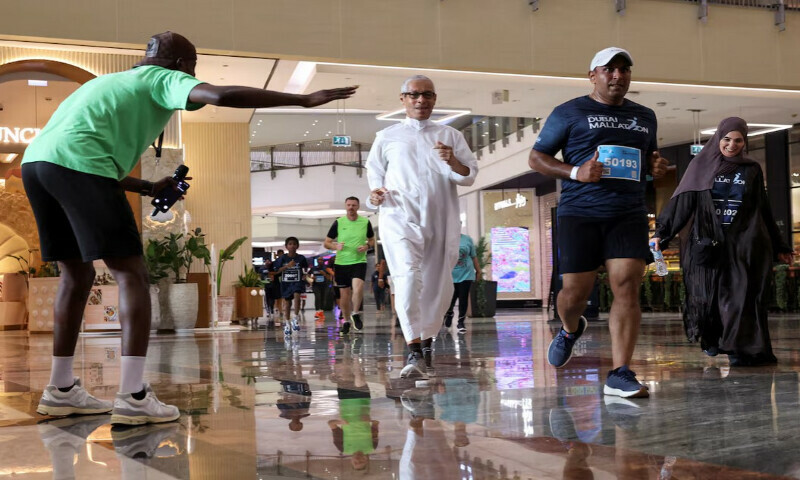 Participants run the Dubai Mallathon, a month-long fitness initiative transforming shopping centres into indoor running tracks throughout August, to escape the scorching summer heat, at City Centre Mirdif in Dubai, United Arab Emirates, August 9, 2025. REUTERS