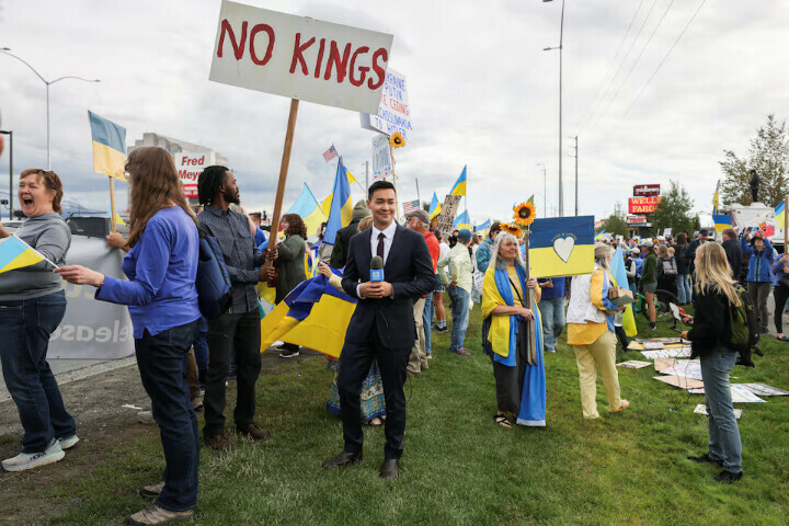   Demonstrators hold placards and flags during a protest in solidarity with Ukraine in Anchorage, Alaska, US. – Reuters  