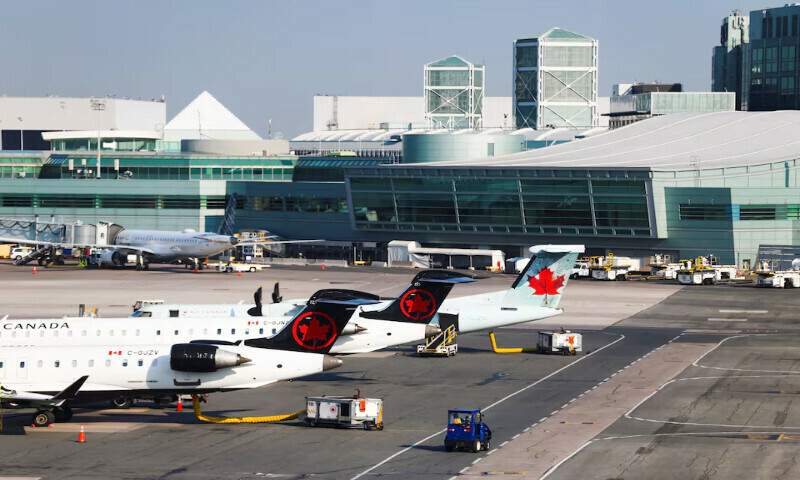 Air Canada planes are parked at the apron at the Toronto Pearson International Airport in Mississauga, Ontario, Canada. – Reuters