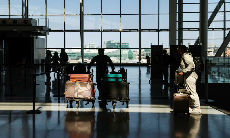 Passengers make their way through Toronto Pearson International Airport ahead of a strike by Air Canada flight attendants in Mississauga, Ontario, Canada. – Reuters
