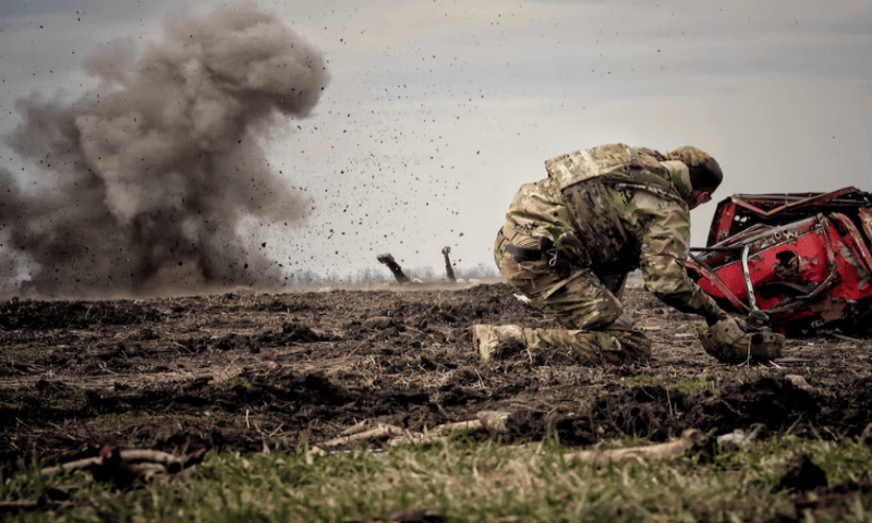 Ukrainian serviceman reacts as he throws a grenade during a training, amid Russia’s invasion of Ukraine, in the Donbas region, Ukraine, on April 8, 2023. Reuters file