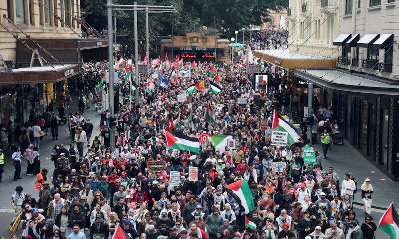Demonstrators hold placards as they take part in the ‘Nationwide March for Palestine’ protest in Sydney, Australia, on Sunday. – Reuters