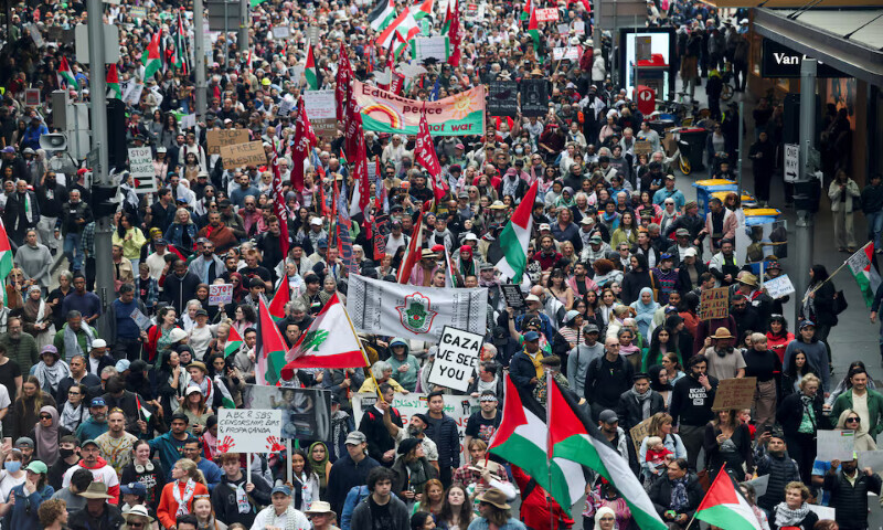 Demonstrators hold placards as they take part in the ‘Nationwide March for Palestine’ protest in Sydney, Australia, on Sunday. – Reuters