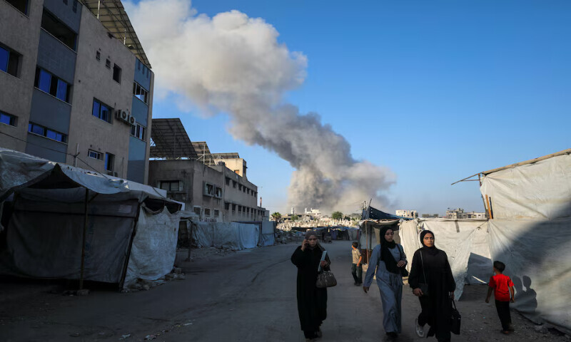 Israel pounds Gaza City suburbs, vows to press on with offensive