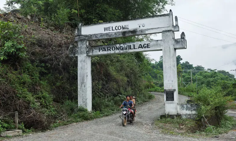 A man rides a motorcycle in Parong village, Siang district, Arunachal Pradesh, India. – Reuters