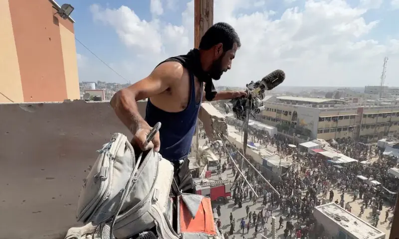 A man holds the equipment used by Palestinian cameraman Hussam Al Masri, who was a contractor for Reuters, at the site where he was killed along with other journalists and people in Israeli strikes on Nasser hospital in Khan Younis in the southern Gaza Strip. – Reuters