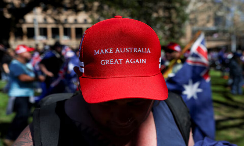 A demonstrator wearing a ‘Make Australia Great Again’ cap poses for a picture during the ‘March for Australia’ anti-immigration rally in Sydney, Australia, on Sunday. – Reuters