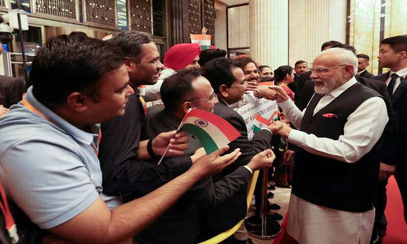 India’s Prime Minister Modi is welcomed by the Indian community upon his arrival for the Shanghai Cooperation Organisation summit at the hotel in Tianjin, China. – Reuters