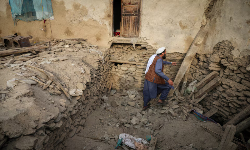 An Afghan man looks for his belongings amidst the rubble of a collapsed house after the deadly magnitude-6 earthquake in Dara Noor in Jalalabad, Afghanistan. – Reuters