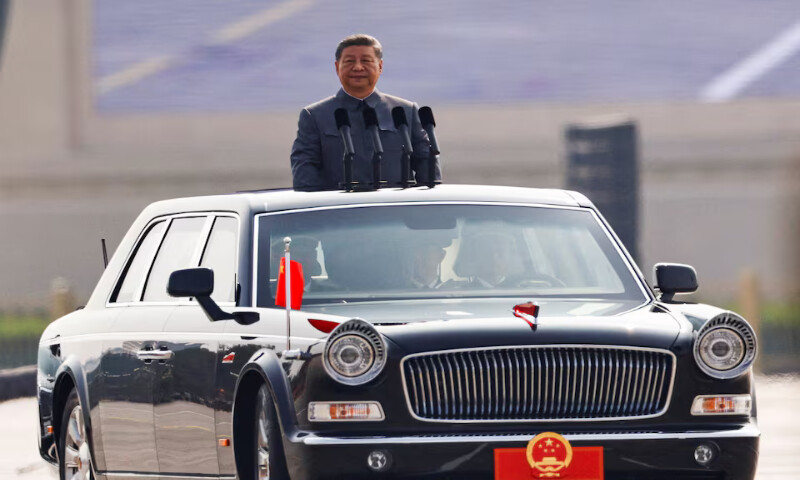 Chinese President Xi Jinping stands in a car to review the troops during a military parade to mark the 80th anniversary of the end of World War Two, in Beijing, China, on Wednesday. – Reuters