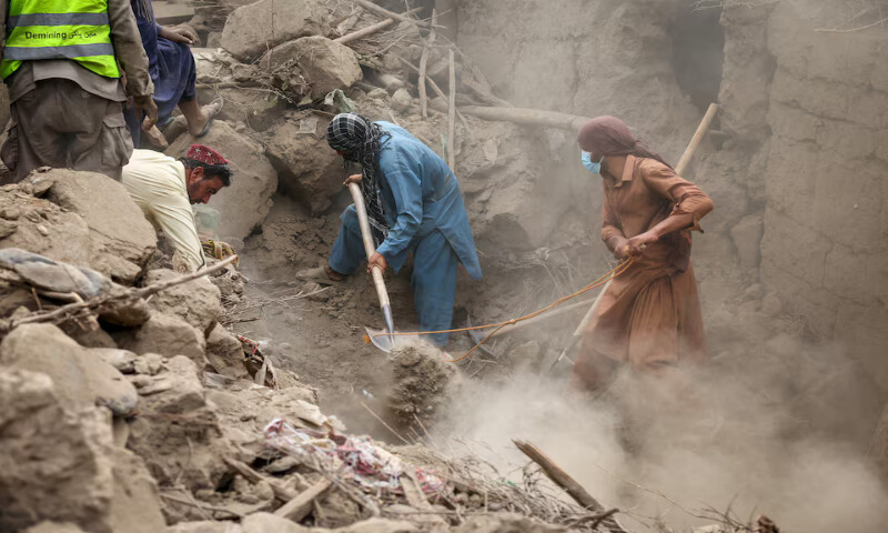 Rescue workers search for victims amidst debris of a damaged house after a deadly earthquake in Mazar Dara, Kunar province, Afghanistan. – Reuters