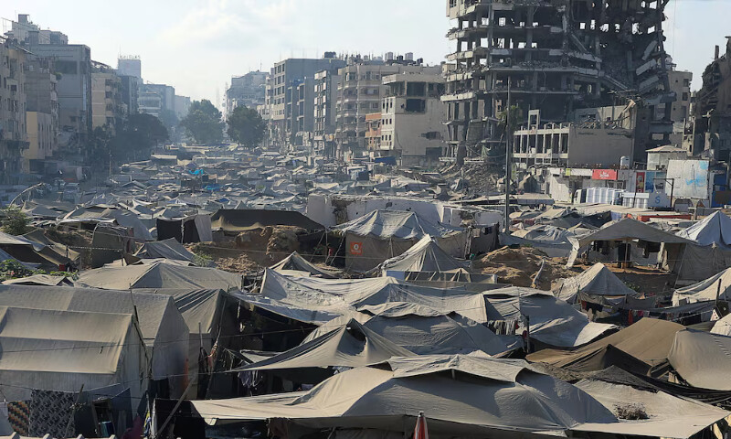 Palestinians displaced by the Israeli military offensive take shelter in a tent camp in Gaza City. – Reuters