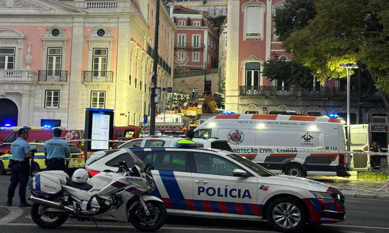 First responders work at the site of an accident at Lisbon’s Gloria funicular in Lisbon, Portugal, – Reuters
