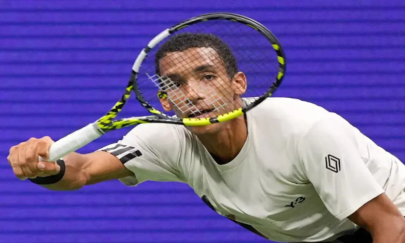 Felix Auger-Aliassime hits to Jannik Sinner (not pictured) during the US Open match in New York. – Reuters