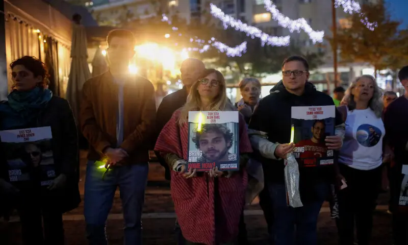 Idit Ohel, mother of Israeli hostage Alon Ohel, 22, and her family, gather with other families of hostages to light candles to mark the first night of the Jewish holiday of Hanukkah, in Karmiel, in northern Israel. – Reuters file