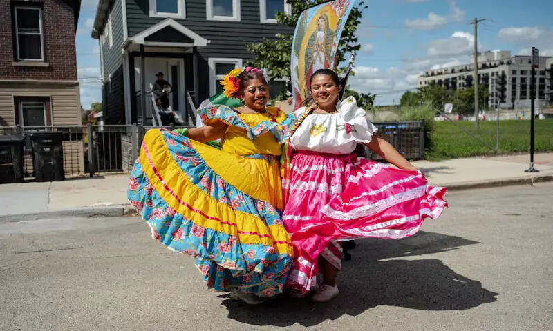 Isabel Garcia and her daughter Melody Gil stand for a portrait as Chicago’s Mexican community proceeds with a Mexican Independence Day parade after US President Donald Trump ordered increased federal law enforcement presence to assist in crime prevention, in Chicago, Illinois. – Reuters