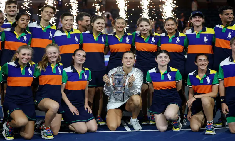 Aryna Sabalenka poses with the trophy and the ball kids after winning the women’s singles final of the US open in New York. – Reuters