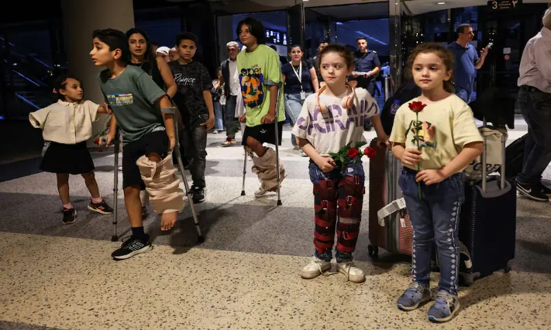 Six Gazan families with wounded children arrive at Beirut-Rafic Hariri International Airport for medical treatment. – Reuters
