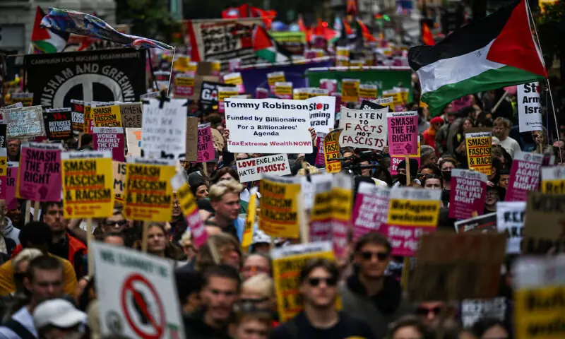 Members of the campaign group, Stand Up to Racism, demonstrate in London, Britain. – Reuters