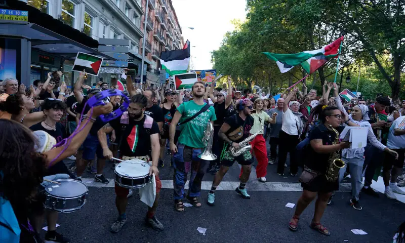 Protesters demonstrate during the Vuelta a Espana cycle race in Madrid. – Reuters