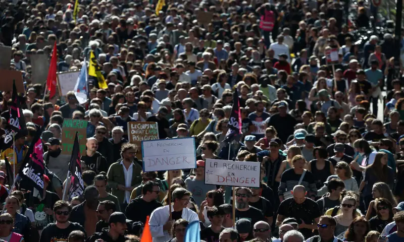 A general view shows protesters holding placards during a demonstration in Nantes, France, on Thursday. – Reuters