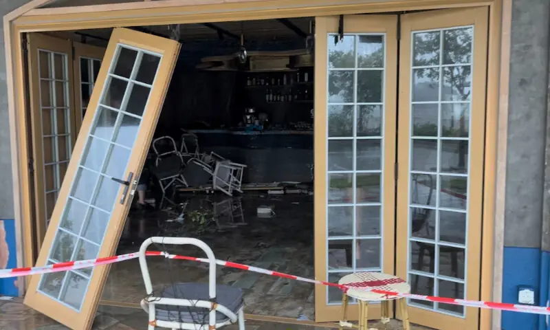 Damaged furniture lies scattered at a restaurant in the aftermath of Super Typhoon Ragasa in Hong Kong, China. – Reuters