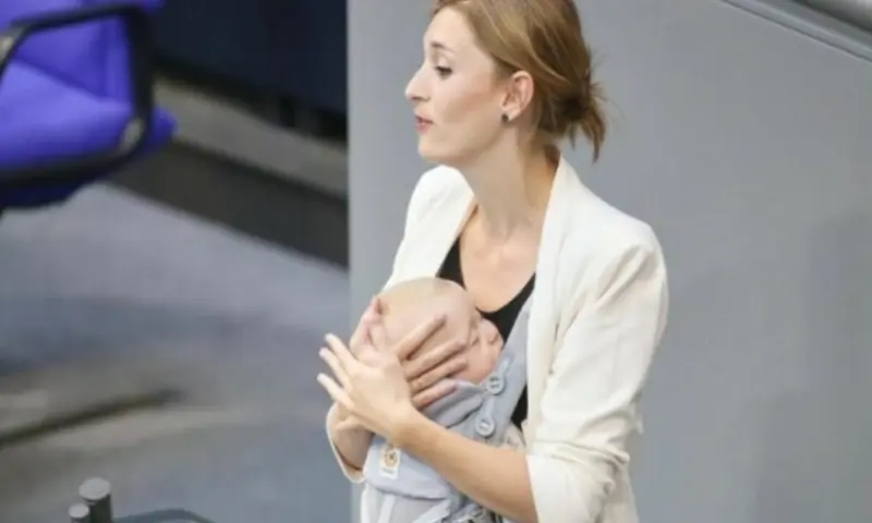 German MP makes history by delivering budget speech with baby in carrier