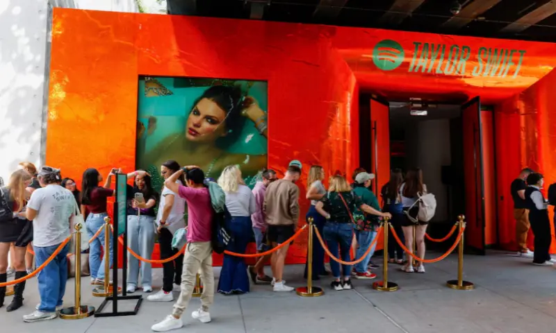 People wait to enter a Spotify pop-up event for Taylor Swift’s album ‘The Life of a Showgirl’ in New York City. Reuters