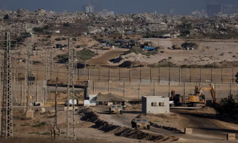 Israeli military vehicles manoeuvre near the Israel-Gaza border, as seen from Israel, on September 19, 2025. Reuters file