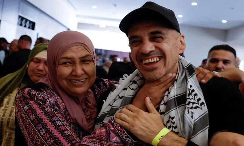 A freed Palestinian prisoner is greeted after being released from an Israeli jail in Ramallah on Monday. – Reuters