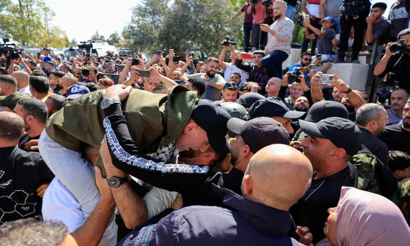 A freed Palestinian prisoner reacts as he meets his family members in Ramallah on Monday. – Reuters