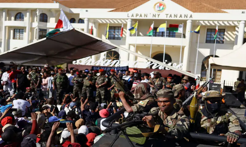 Colonel Michael Randrianirina speaks on stage after joining protesters in Antananarivo, Madagascar, on Tuesday. – Reuters
