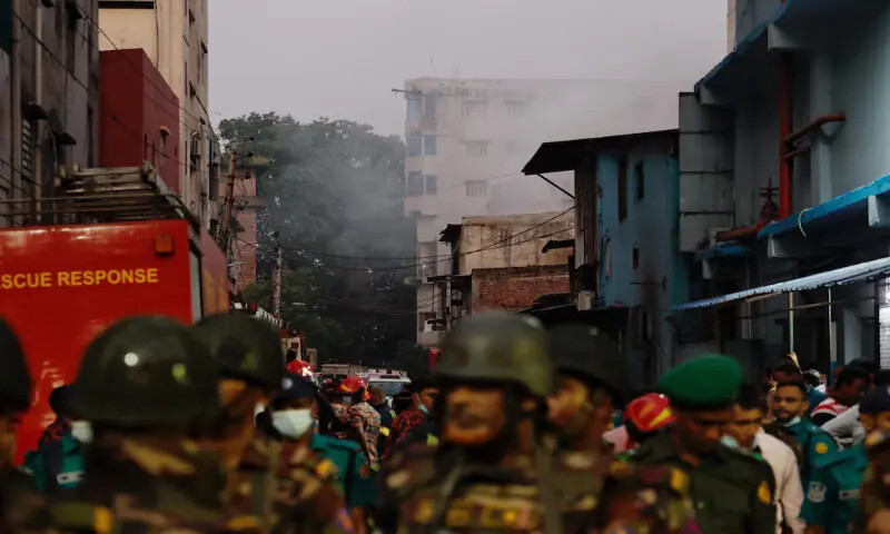 Smoke rises from a building as fire broke out at a garment factory and a chemical warehouse in Dhaka, Bangladesh, on Tuesday. – Reuters