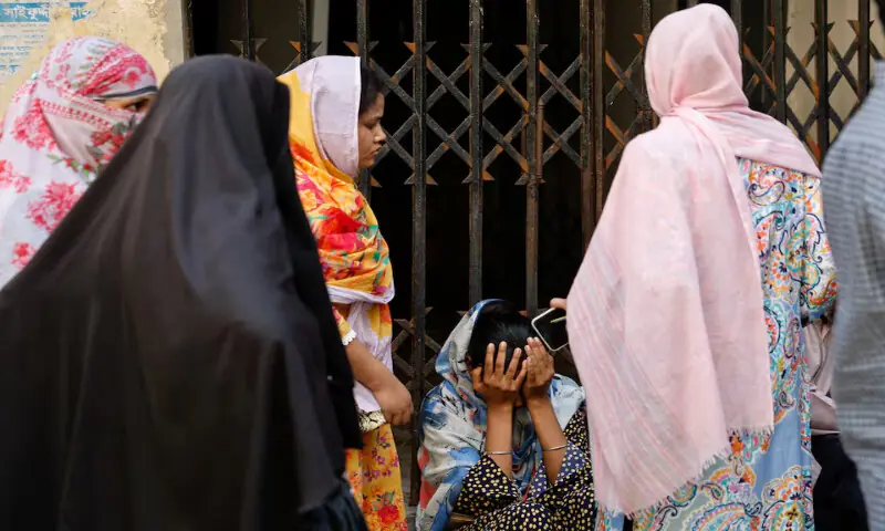 People mourn as they come to receive a deceased relative’s body from the Dhaka Medical College Hospital morgue in Dhaka, Bangladesh, on Wednesday. – Reuters