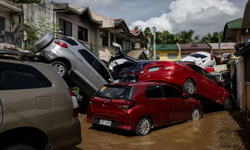 Cars swept away after heavy flooding brought on by Typhoon Kalmaegi are piled up at a subdivision in Bacayan, Cebu City, Philippines, on Wednesday. – Reuters