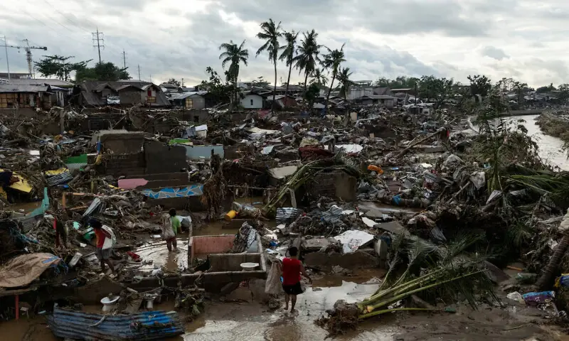 Residents return to the remains of their wrecked homes after heavy flooding caused by Typhoon Kalmaegi in Talisay, Cebu, Philippines, on Wednesday. – Reuters