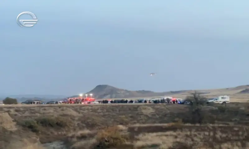 Emergency teams work at the site of the Turkish C-130 military cargo plane crash near the Azerbaijani border, in Sighnaghi municipality, Georgia, on November 11, 2025, in this still image taken from video. TV.IMEDI/Reuters
