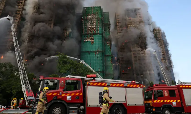Hong Kong police arrest three as apartment fire death toll rises to 75
