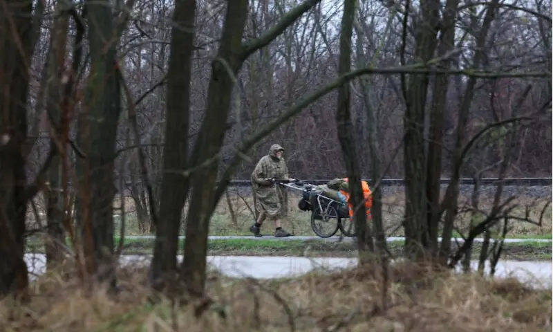 British ex-paratrooper Karl Bushby, who has been walking across the world for 27 years, walks in Komarom, Hungary, November 25, 2025. Reuters